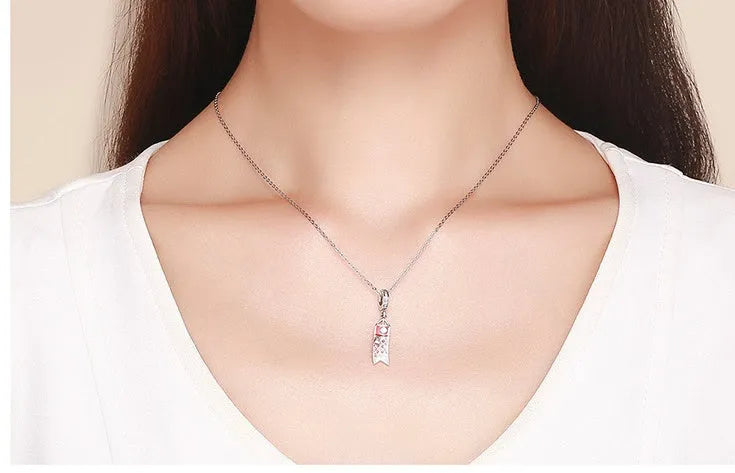S925 sterling silver carp streamer pendant with zircon stones, measuring 2.8cm.