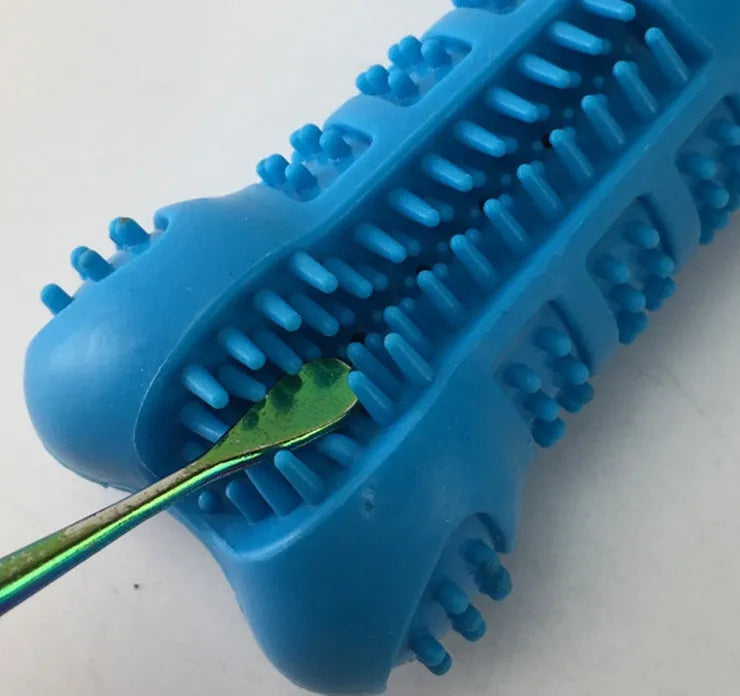 Bone-shaped silicone dog molar stick with bristles for teeth cleaning and easy toothpaste hole