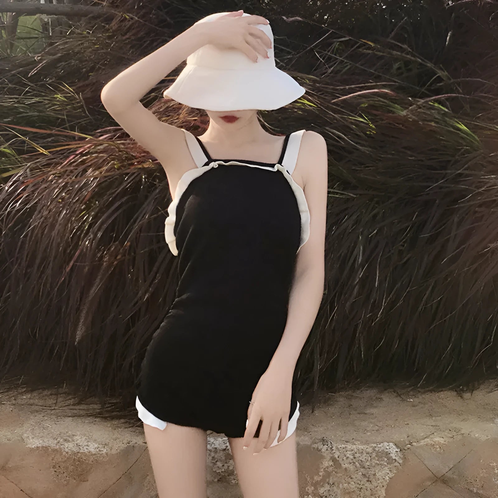 Conservative women's one-piece swimsuit in nylon fabric showing colour options