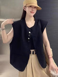Women's loose fit polyester vest with pocket in beige or black colours