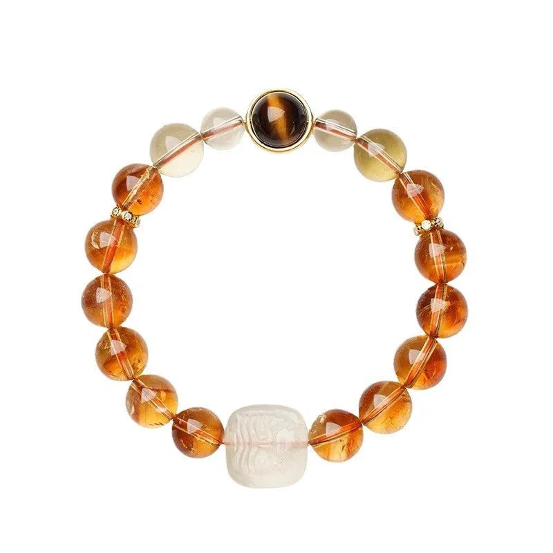 Women's carved citrine bracelet with geometric patterns on 10mm crystal beads in ethnic style