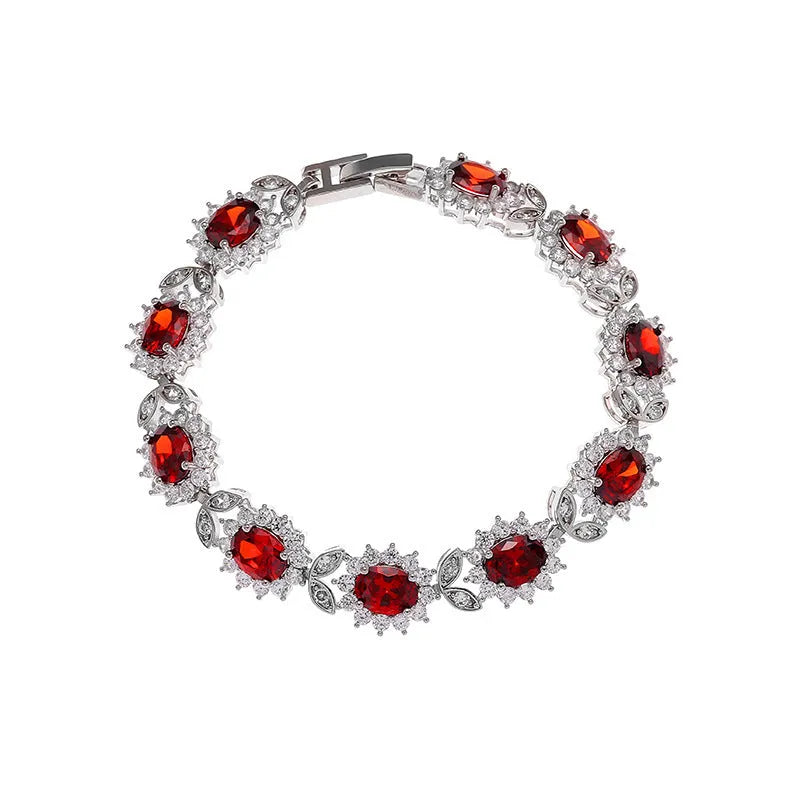 Women's bracelet with coloured zircon stone inlays in environmentally friendly alloy with electroplated finish