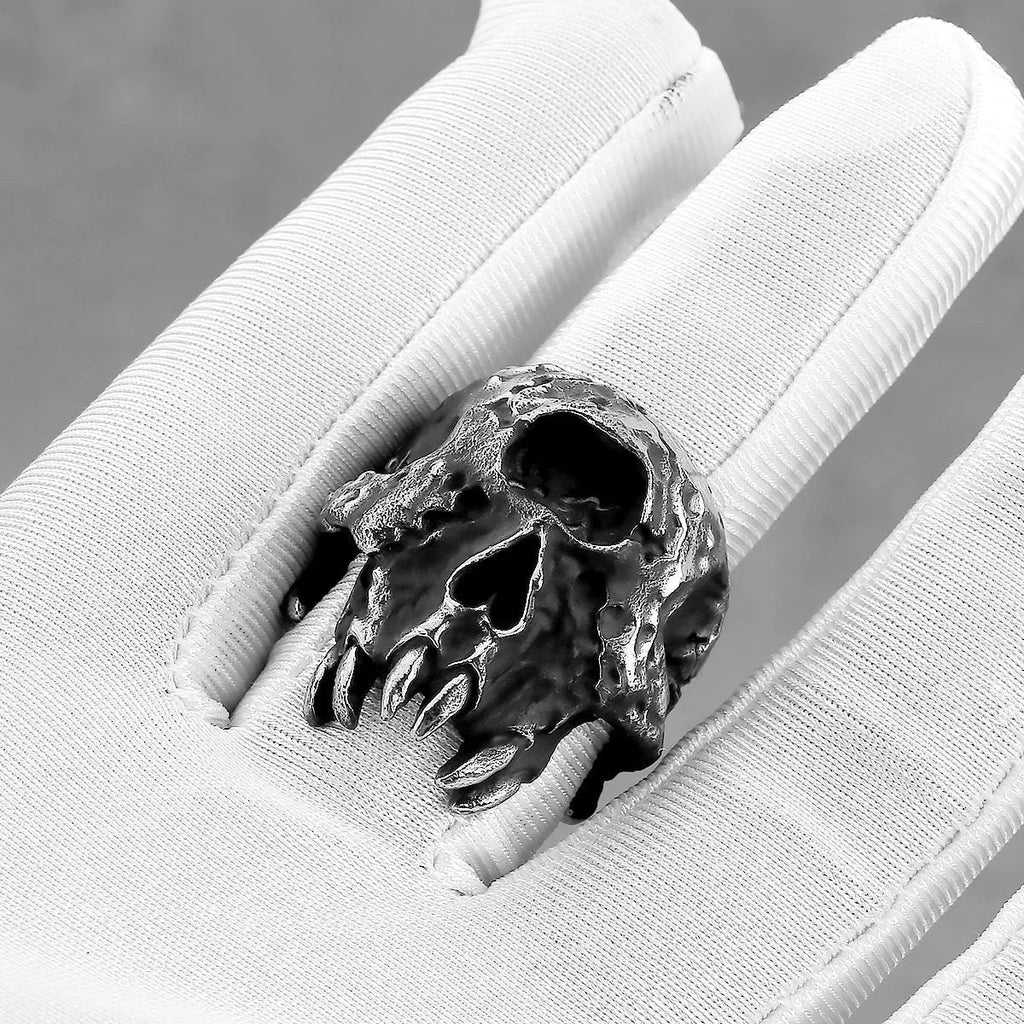 Silver alloy ring with a detailed one-eyed skull design in a retro punk style.