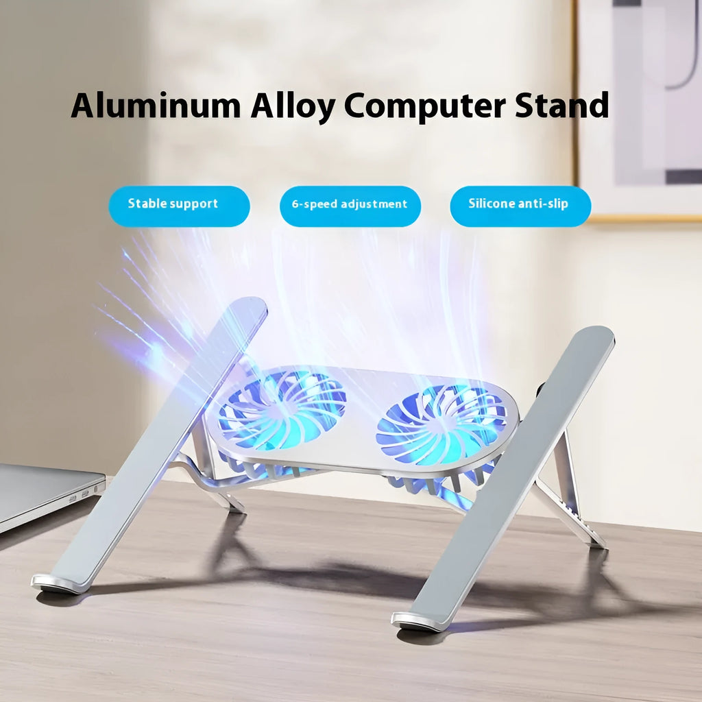 Silver aluminium alloy laptop cooling stand with dual fans in a raised, open position on a desk.
