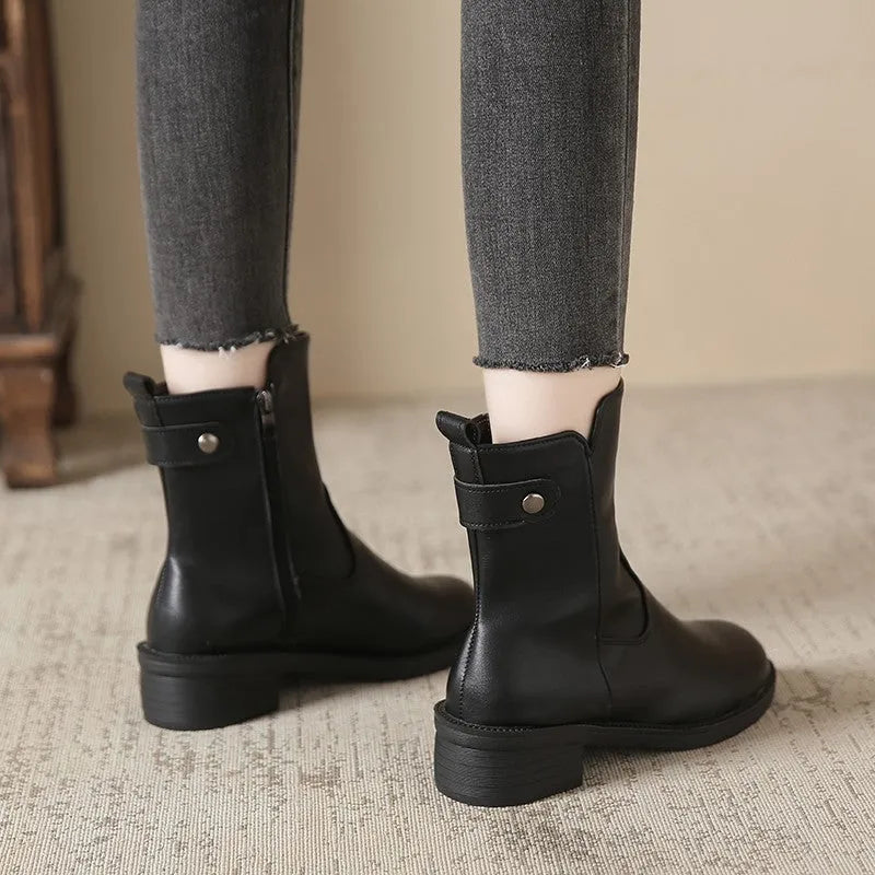 Women's black side zip low heel boots with round toe design