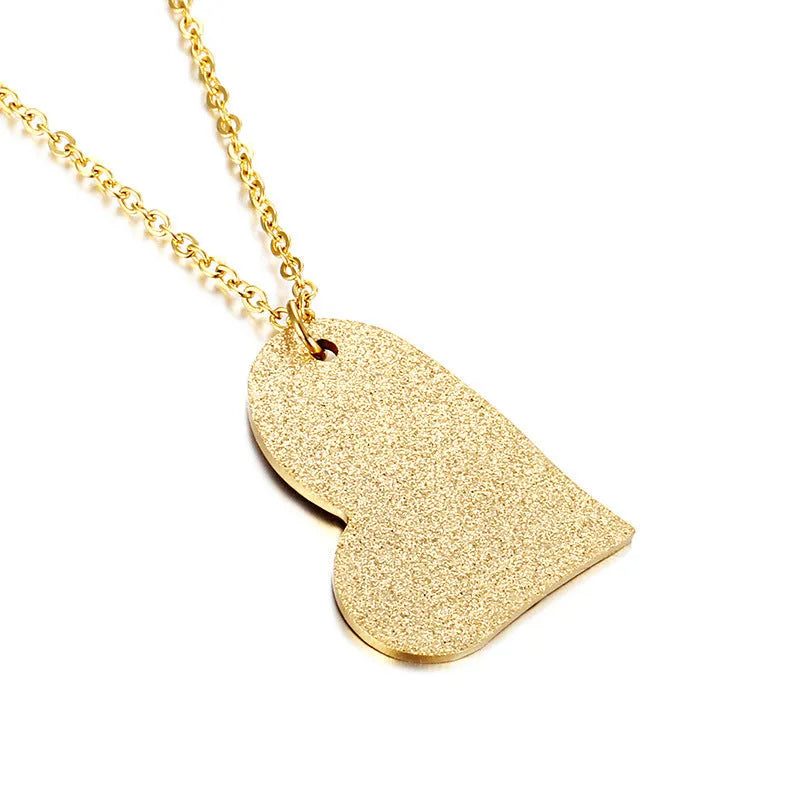Geometric heart-shaped titanium steel pendant necklace on model