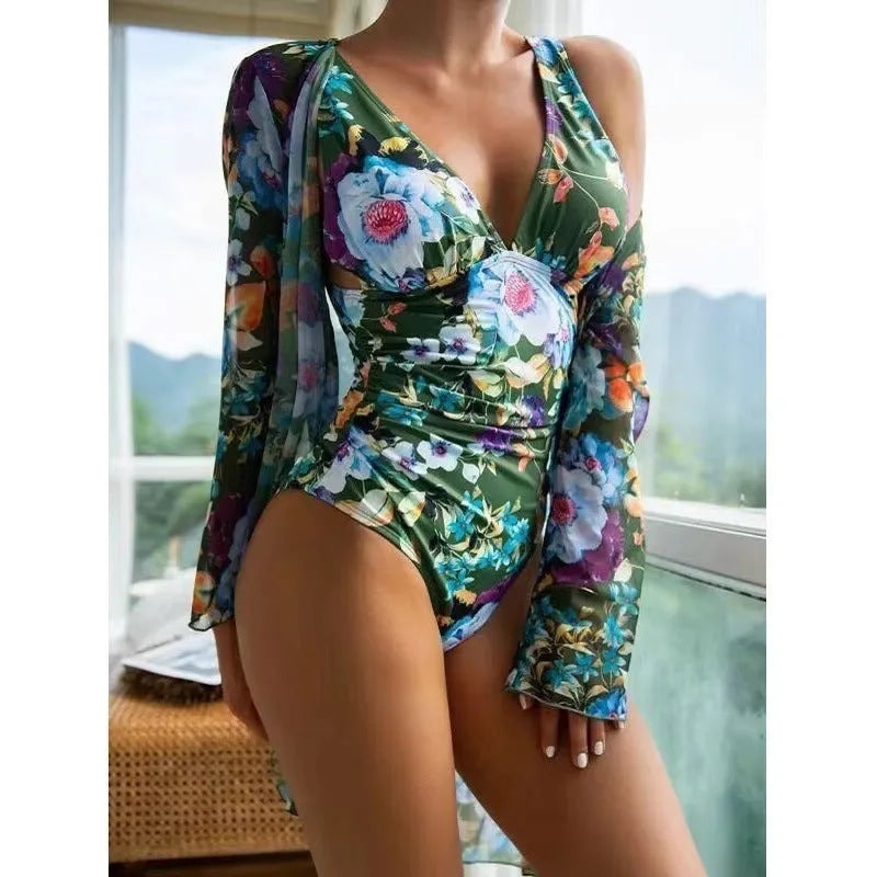 Women's floral patterned bikini and matching coat swimwear set in one of seven available colours.