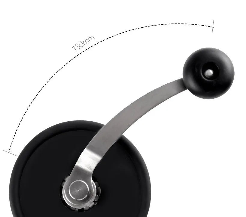 Hand grinder coffee machine with beech wood body and black finish on a countertop, width 88mm