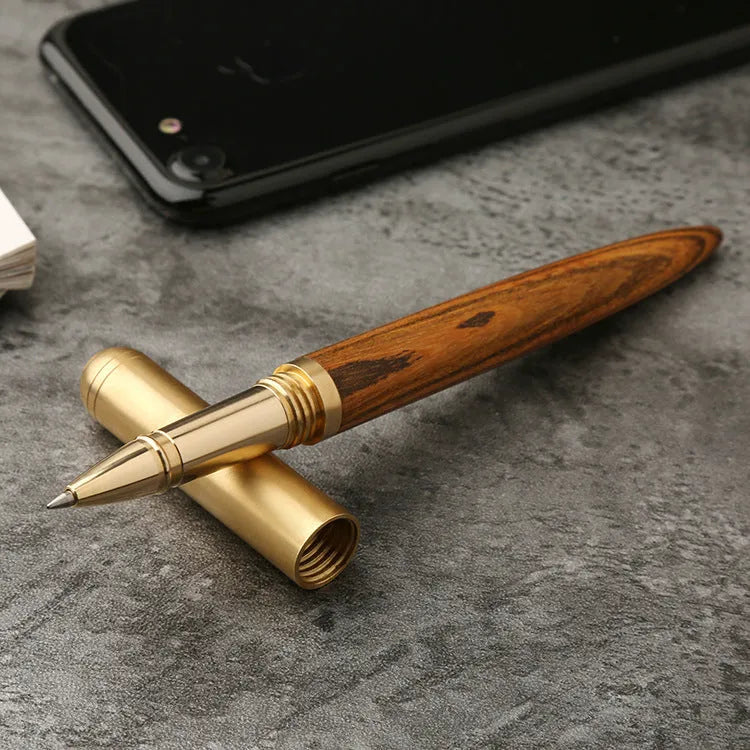 Brass sandalwood signature pen 14cm solid wood metal barrel ballpoint on white background