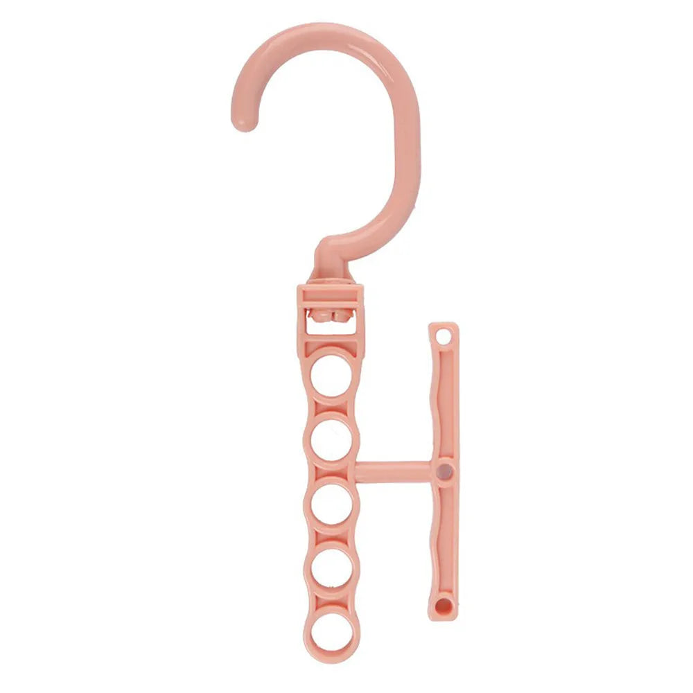 Blue revolving wardrobe hanger with five rotating branches and handle for space saving