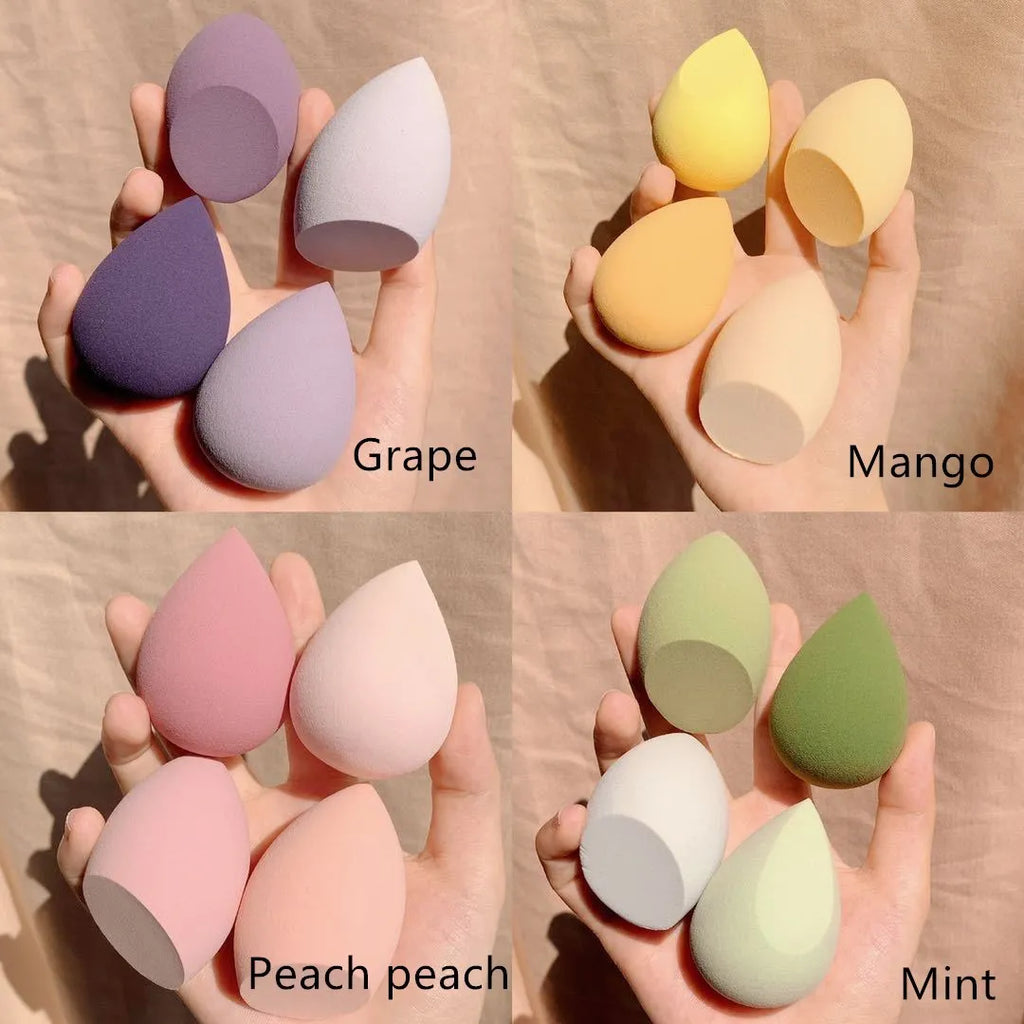 Makeup egg box containing four synthetic sponge beauty applicators in assorted colours including grape, mango, mint, and peach