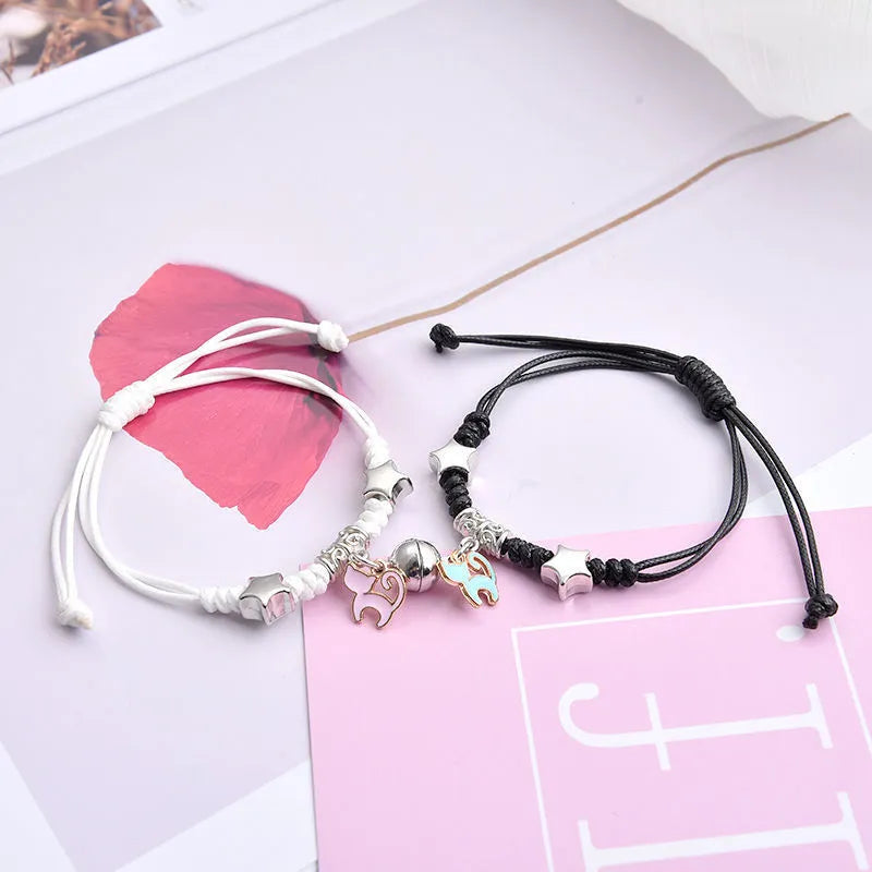 Alloy magnetic suction bracelet pair for couples with symbolic design options