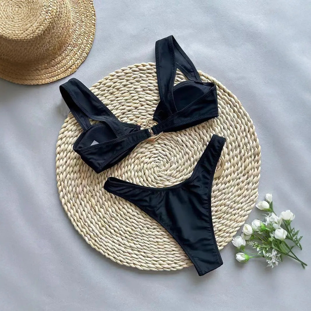 Women's black printed nylon bikini swimsuit set on model