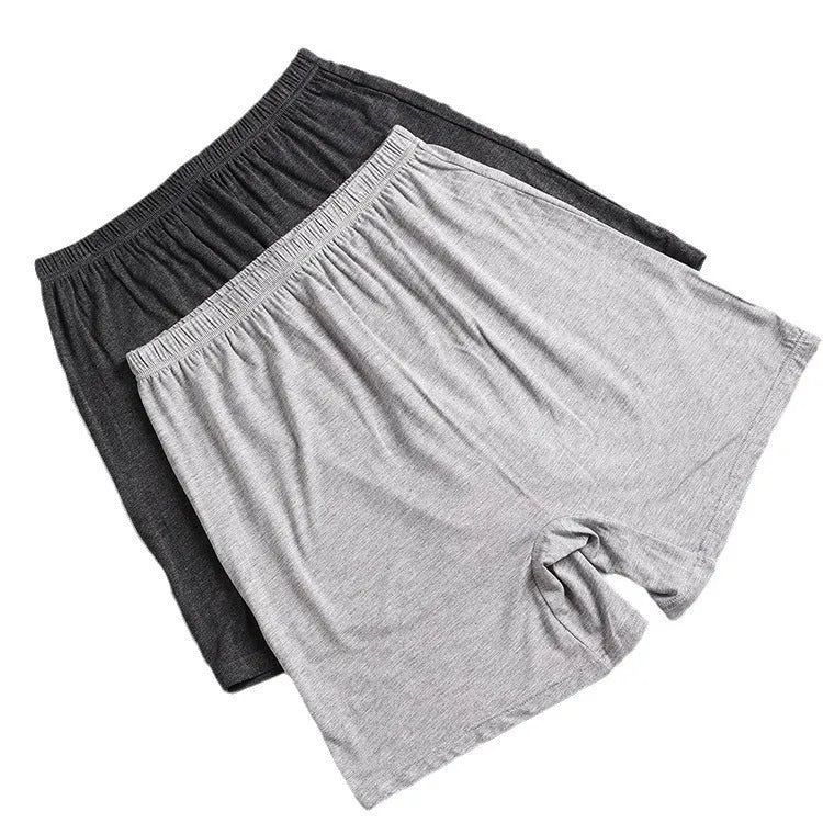 Men's solid colour modal boxers in black, blue, grey, and brown with high waist design