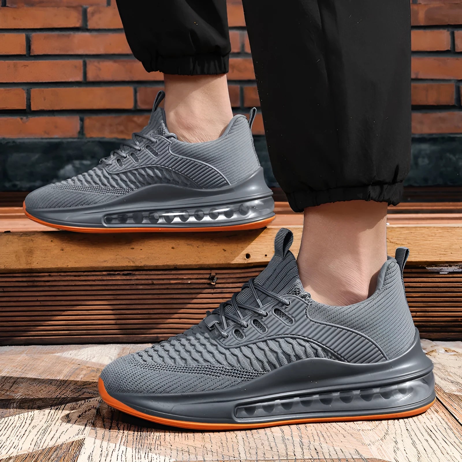 Men's black mesh running shoes with rubber sole and lace-up front
