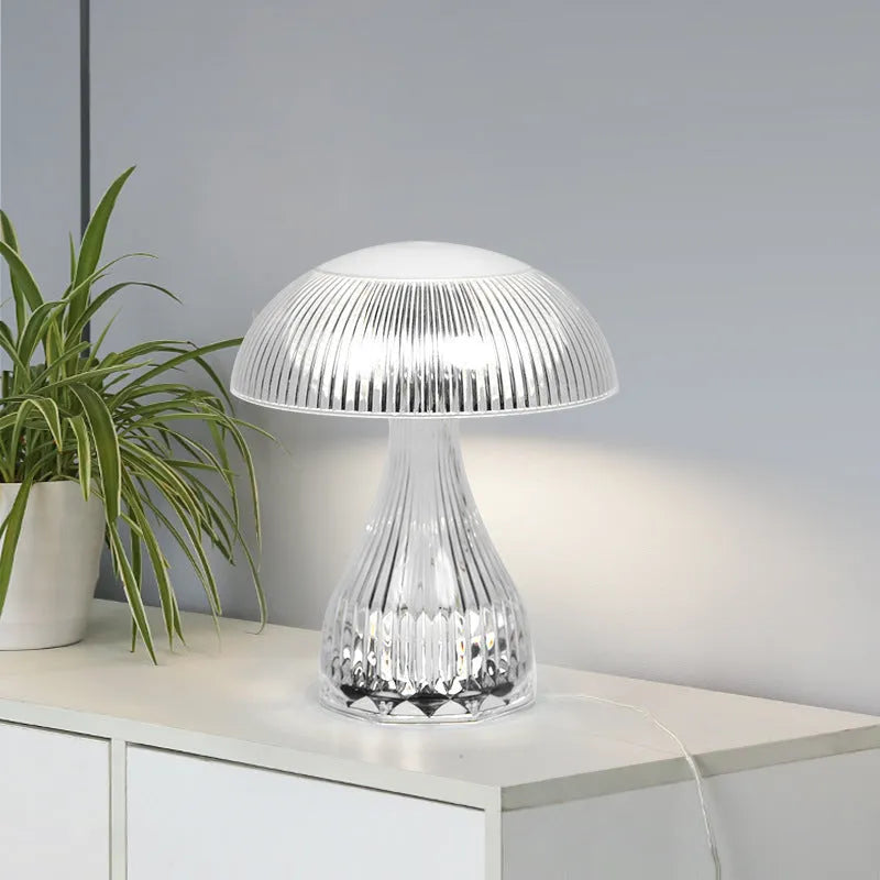 Small white acrylic touch-control night lamp with USB charging cable.