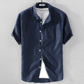 Man wearing a loose fit apricot coloured short sleeve linen cotton blend casual shirt