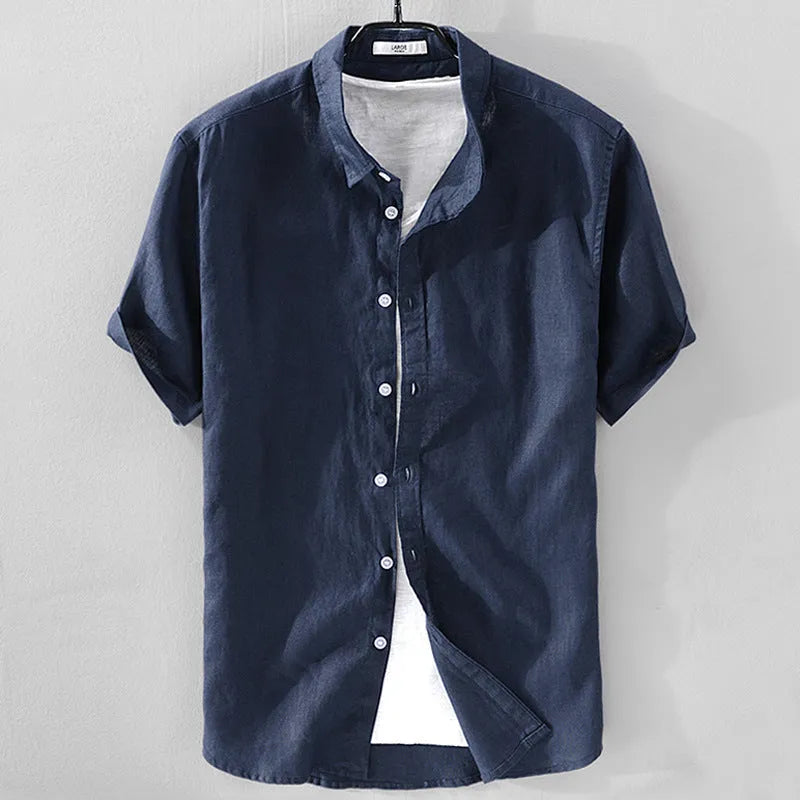 Man wearing a loose fit apricot coloured short sleeve linen cotton blend casual shirt