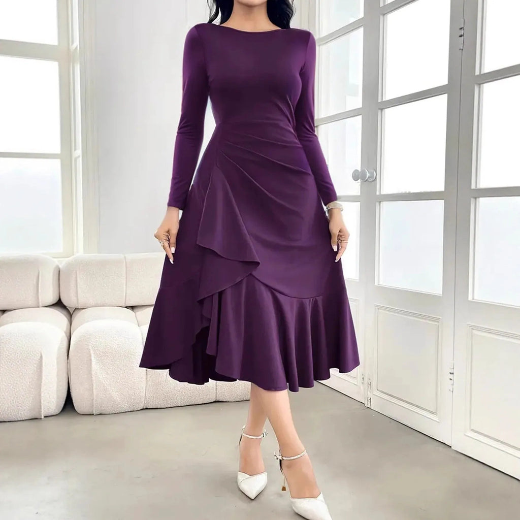 Purple women's long sleeve dress with ruffles and a round neck.