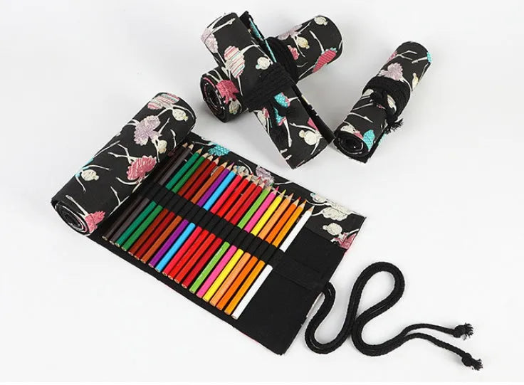Square canvas rolling pencil case with ballet girl print, shown with curtain unrolled to reveal multiple pencil holes.