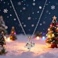 Two-tone copper Christmas tree necklace with inlaid zircon and adjustable O-ring chain on white background