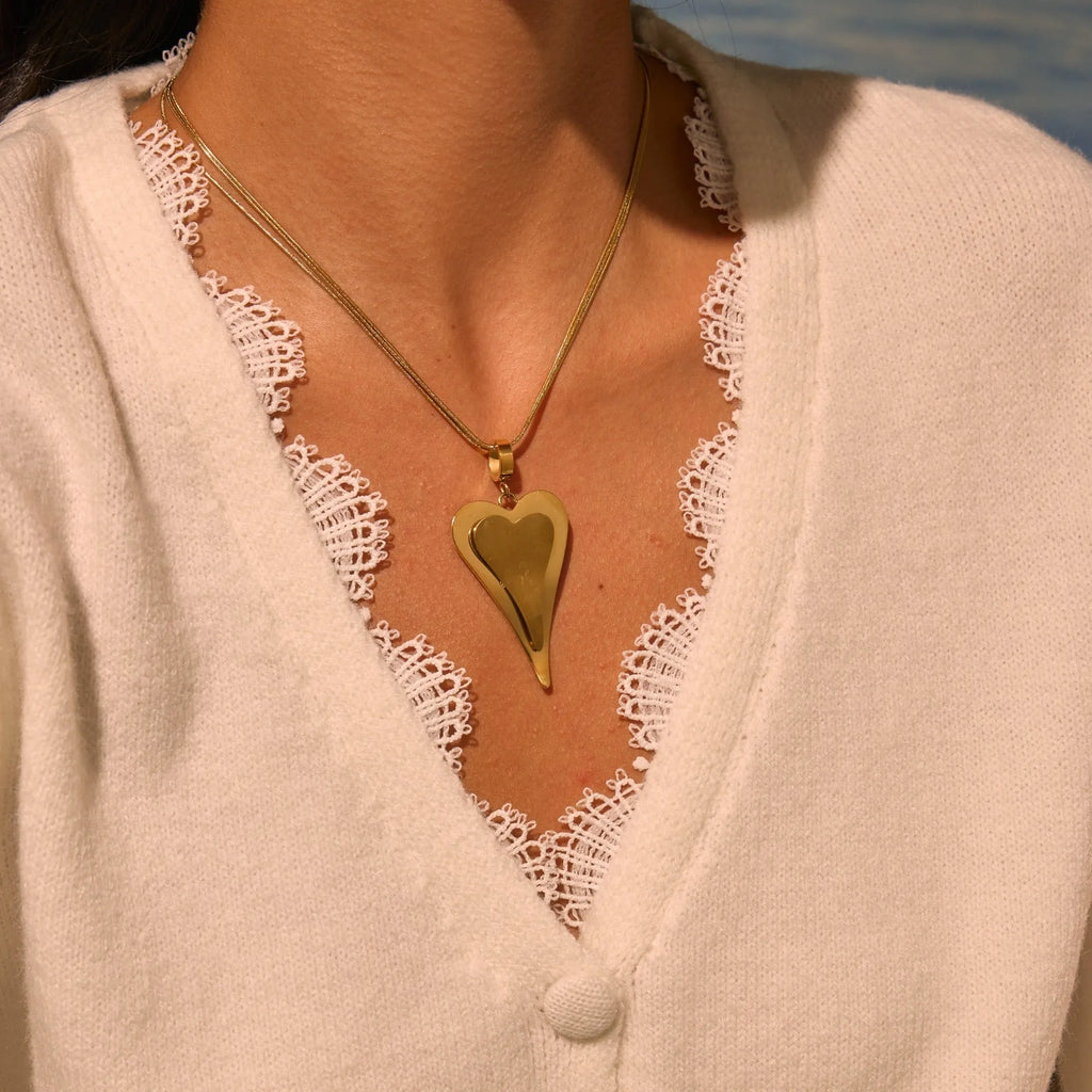 Women's stainless steel necklace with geometric double heart snake bones pendant in gold or steel finish