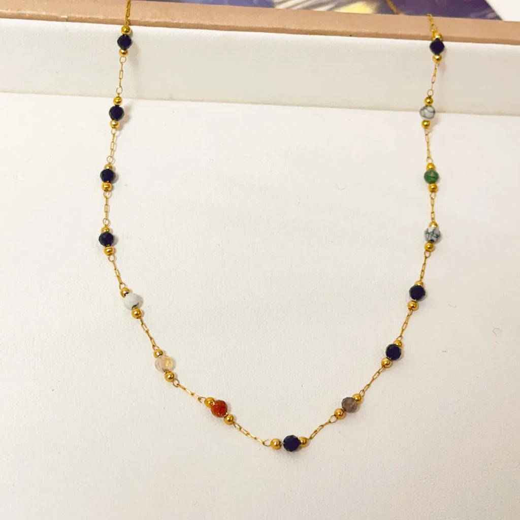 Gold titanium steel necklace with a natural stone pendant on an adjustable O-ring chain.