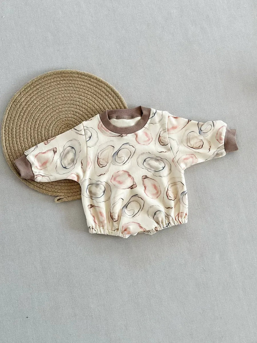 Cotton baby long-sleeved jumpsuit in oyster colour with long sleeves and snap buttons
