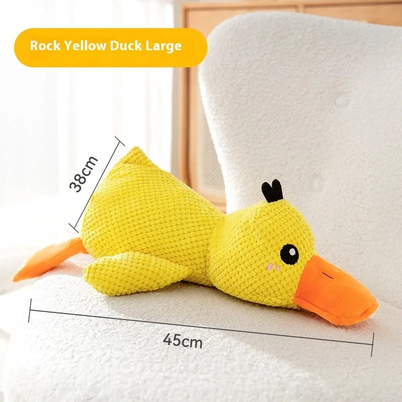 Bite-resistant dog toy with squeaker in rock yellow duck style on white background