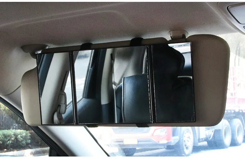 Silver folding car visor makeup mirror shown open and closed on a car sun visor