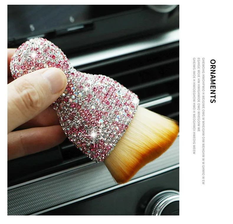 White PVC car interior cleaning brush on a car dashboard, showing its compact size and soft bristles.