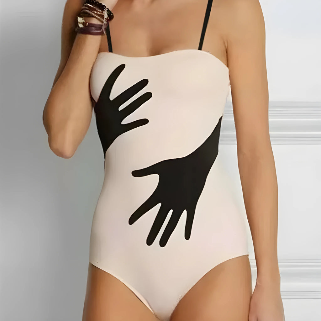 Women's one-piece bikini swimsuit with a gauze skirt in polyester fabric.
