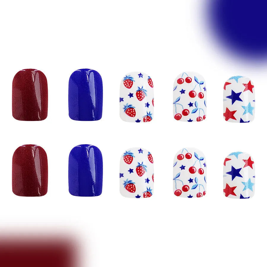Short glossy red and blue nail stickers with strawberry and cherry pattern, pack of 24.