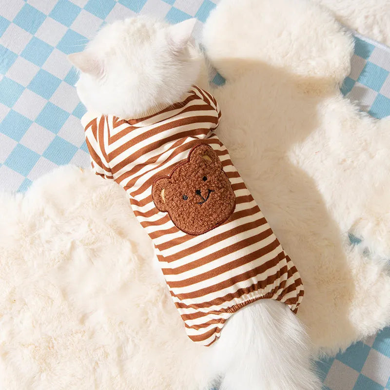 Cute kitty wearing an anti-lint Dralon pet coat in white polka dot banana design