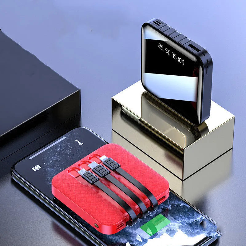 Black power bank with built-in charging cable showing 10000mAh capacity