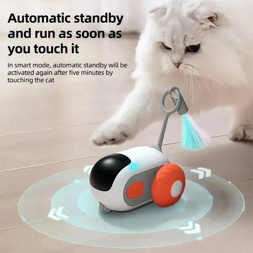 Blue remote controlled toy car with feather attachment for cat play with USB charging cable