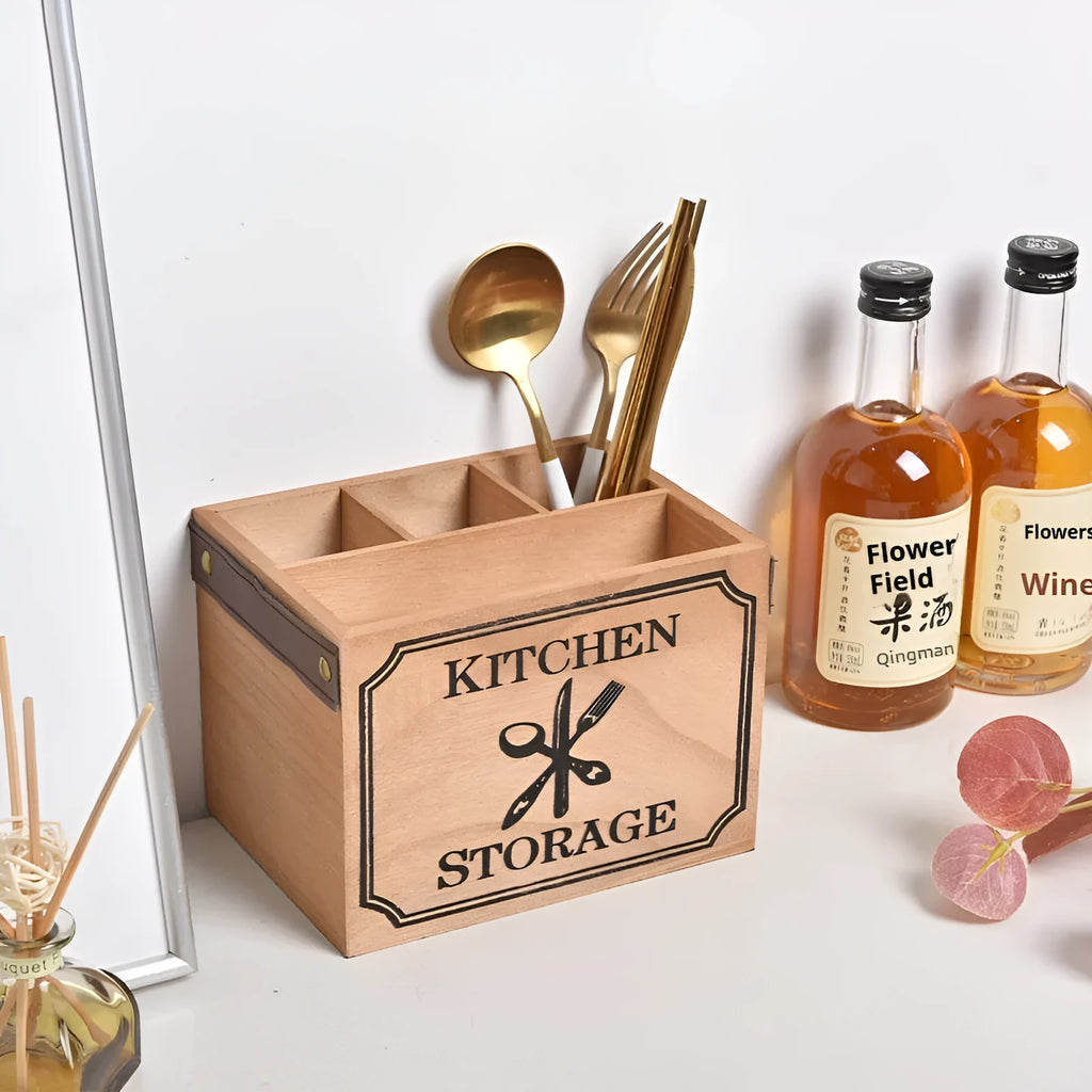 Open-top wooden kitchen storage box with internal grid divider for knives, forks, and chopsticks.