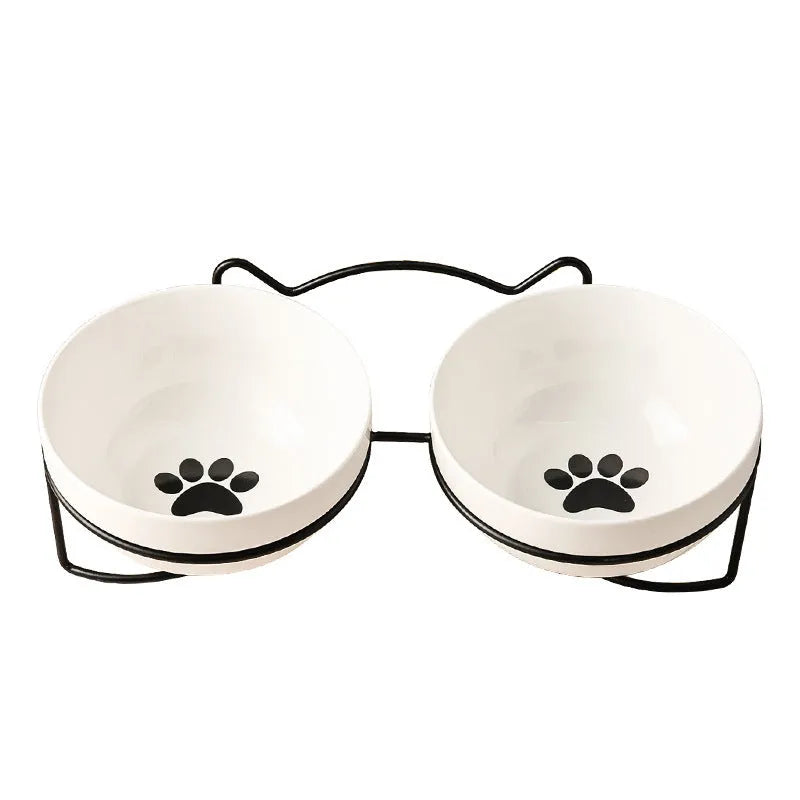 Ceramic cat bowl with iron frame in cat paw or fishbone print