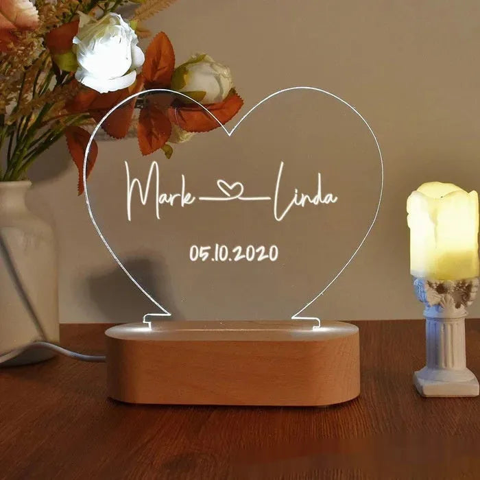Custom LED night light with engraved names and date on transparent acrylic panel