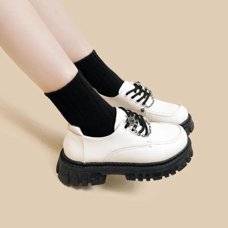 Women's preppy style loafers with metal cross-strap in Duke Asterism colour