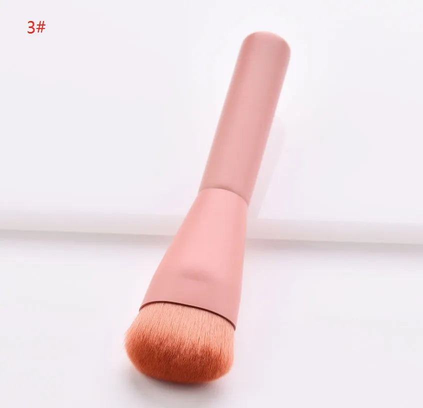 Ten cosmetic makeup brushes with wooden handles arranged showing various brush head shapes and sizes