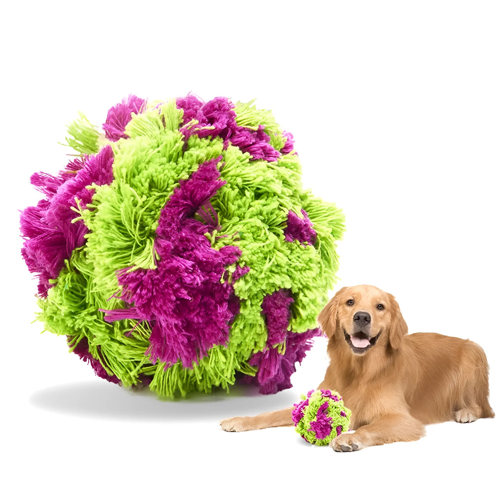 Purple plush knotty seaweed style dog chew toy ball for puppy teething and interactive fetch games.
