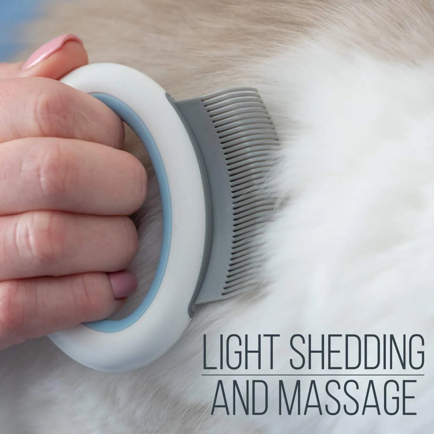 Blue pet grooming comb for cats and dogs on a white background, showing ergonomic handle and soft teeth.