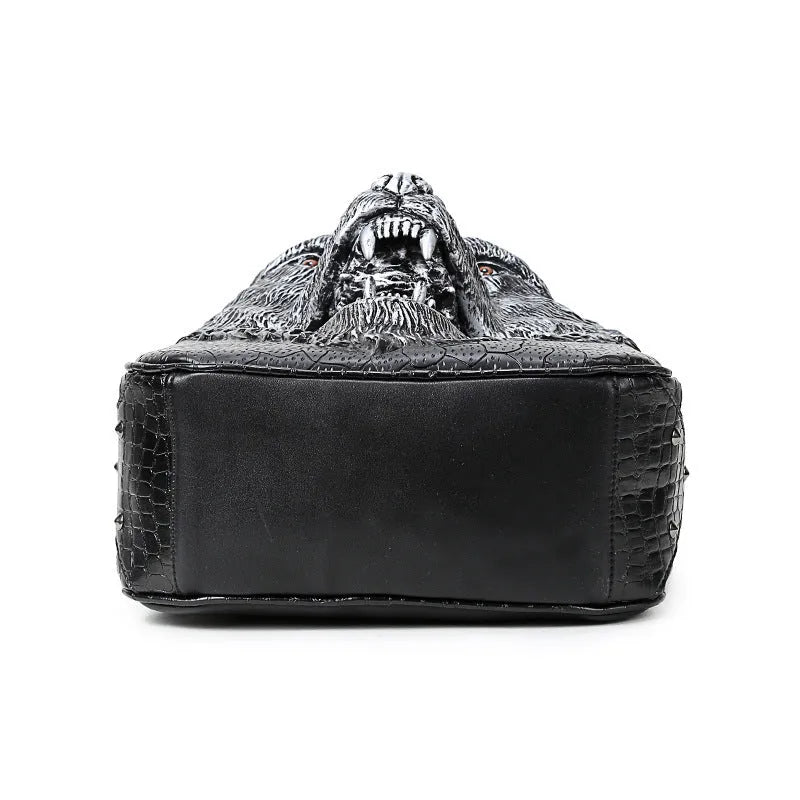 3D wolf head PU leather backpack in black with rivet details, large capacity, side view