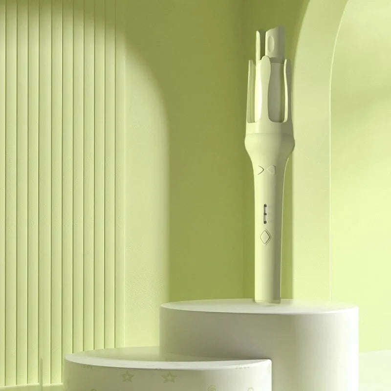 White brand automatic hair curler with 32mm barrel and choice of plug adapters