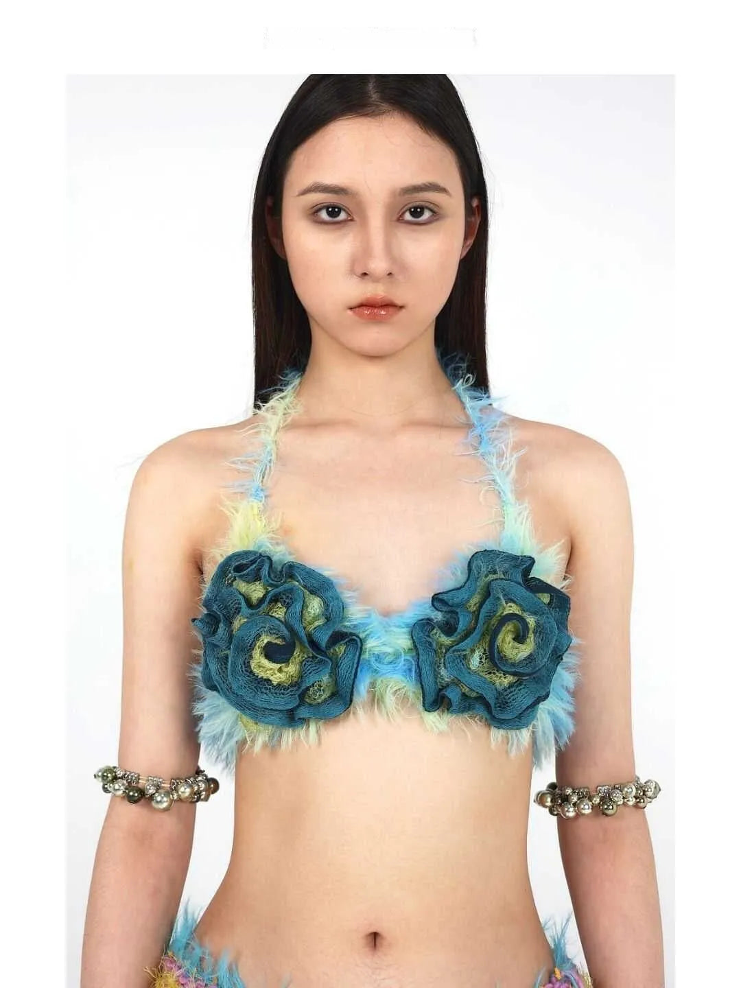 Blue floral bikini top with handmade wool knitting effect on woman model summer beachwear