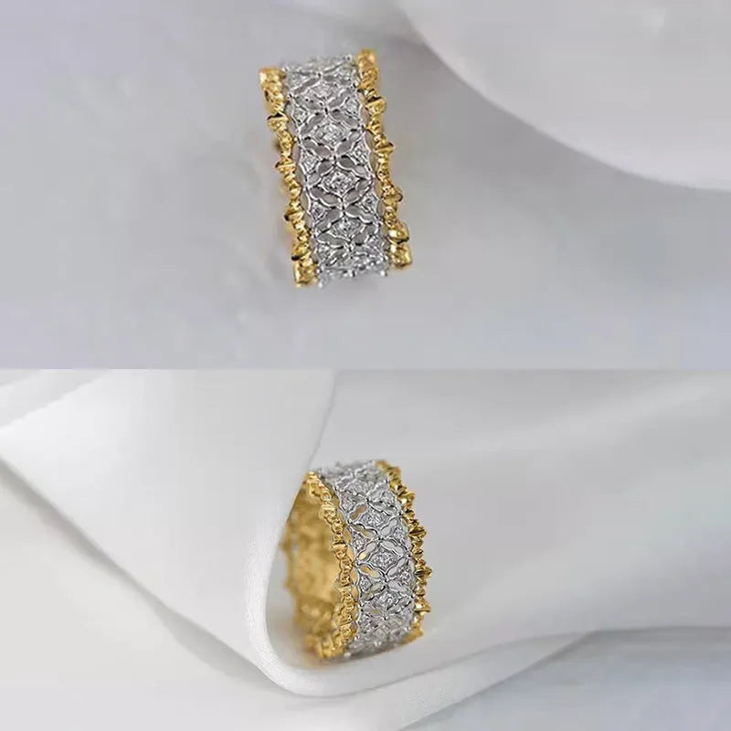 Geometric two-tone copper ring with a round zircon stone, shown in gold colour.