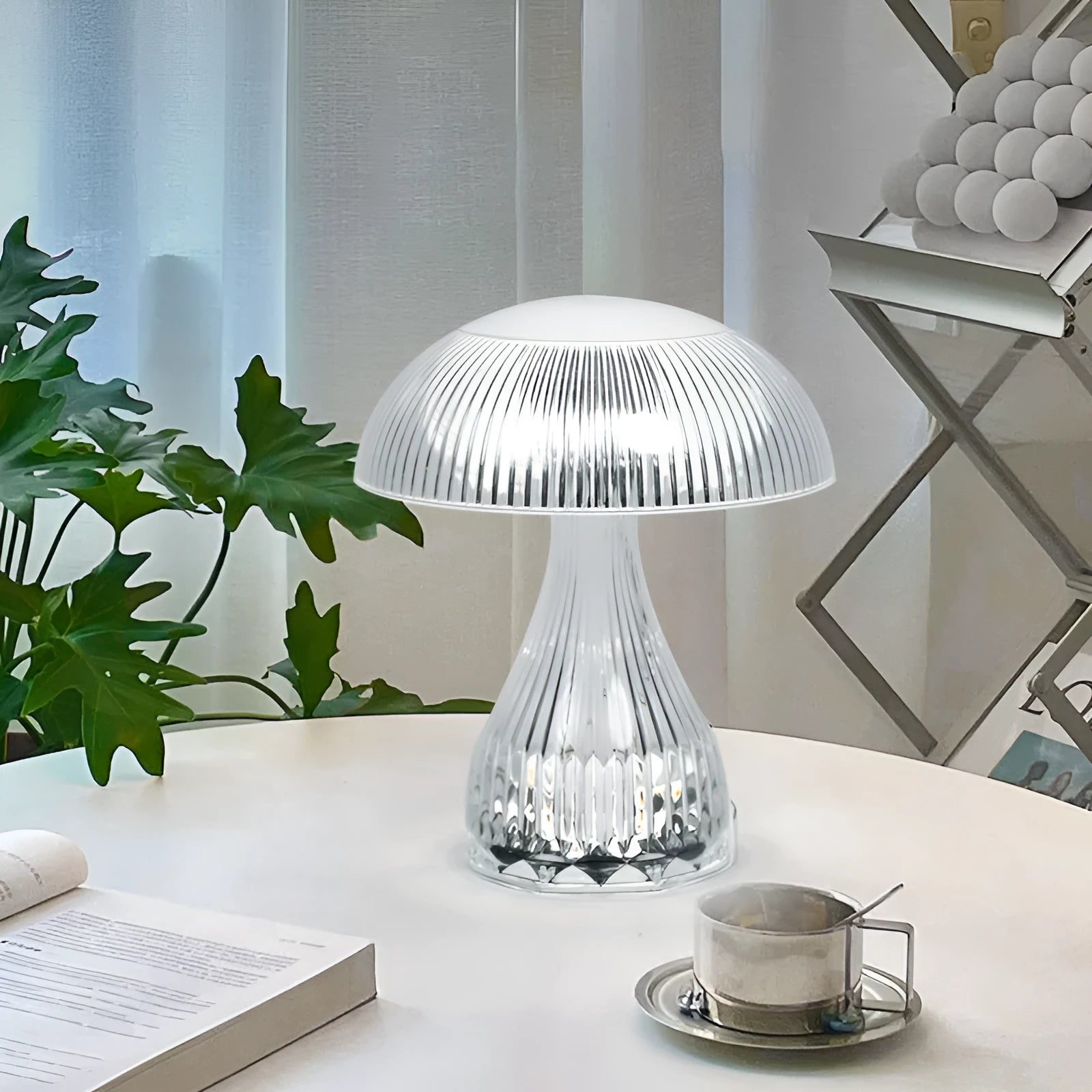 Small white acrylic touch-control night lamp with USB charging cable.