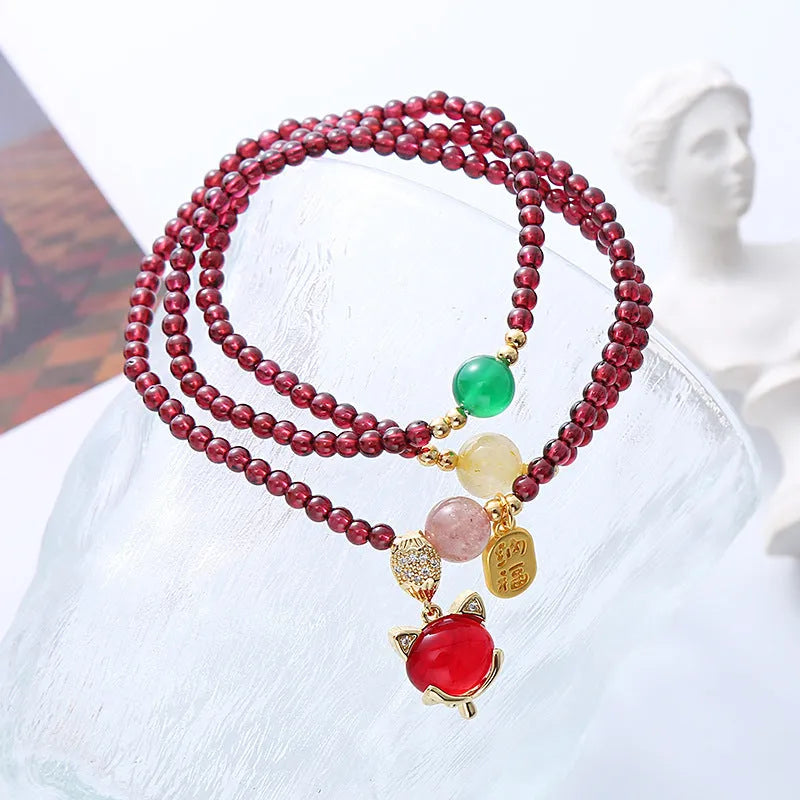 Purplish red garnet fox bracelet with adjustable rope tie for women