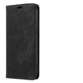 Magnetic flip phone case for iPhone in black, showing TPU frame and leather cover.